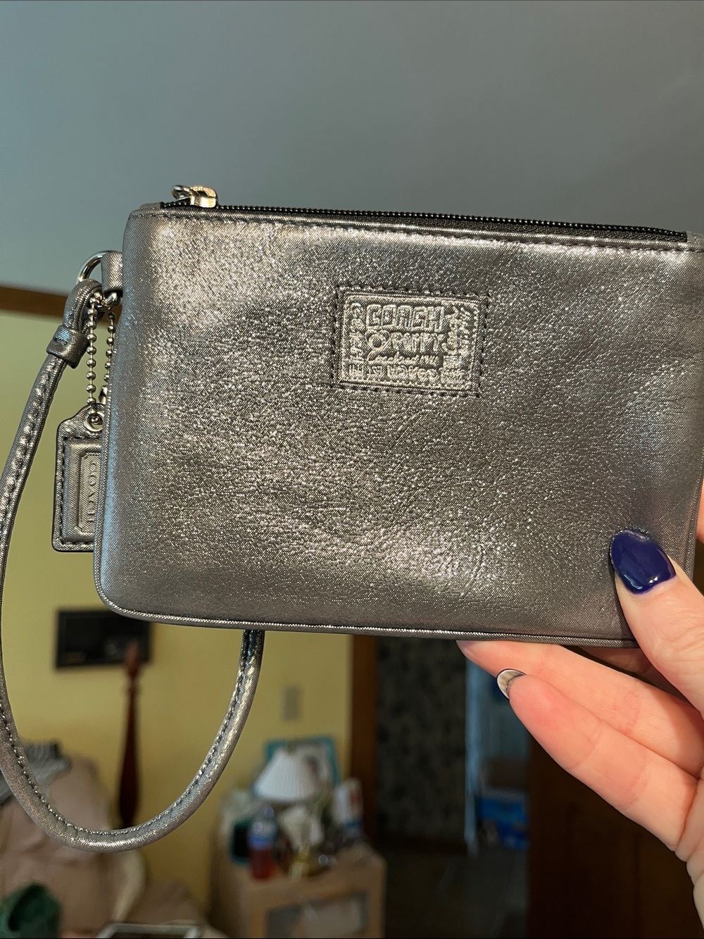 EUC Coach Poppy Metallic Silver Wristlet with hangtag
